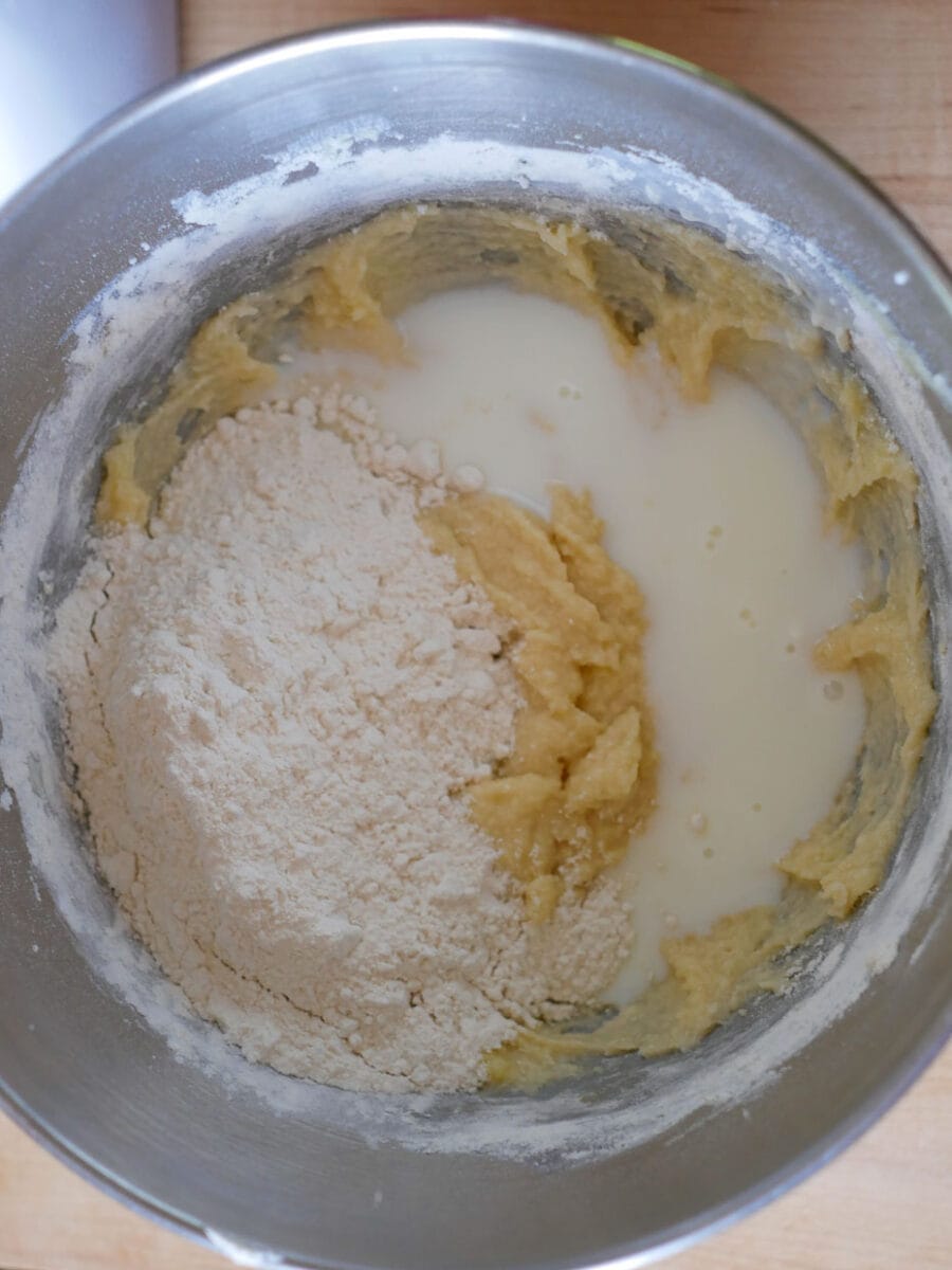Adding the flour and buttermilk to the batter.