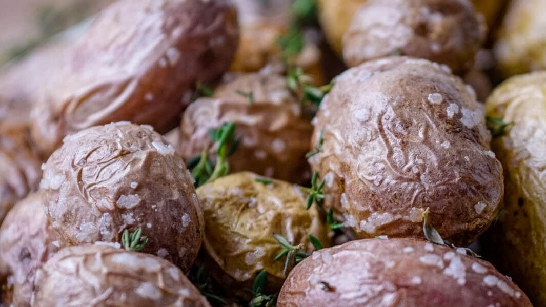 close up of baby potatoes on a plate