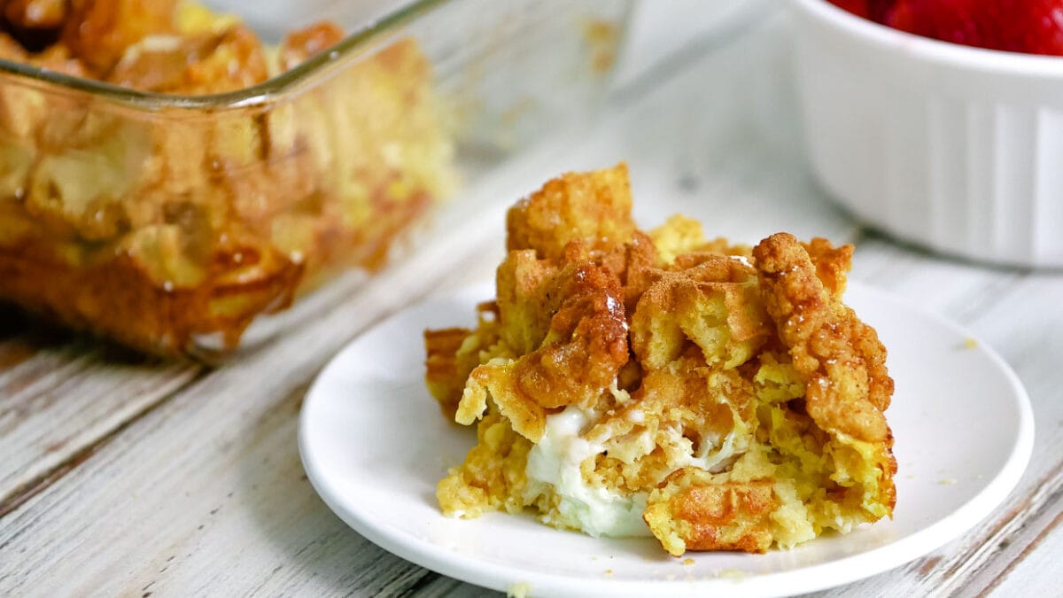 Close up of a piece of chicken and waffle casserole.