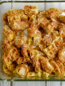Closeup of chicken and waffle casserole in the baking dish.