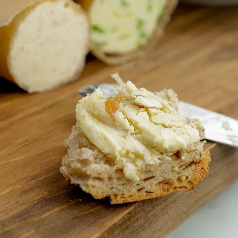 Bread spread with garlic butter.