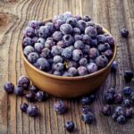Frozen blueberries in a bowl.