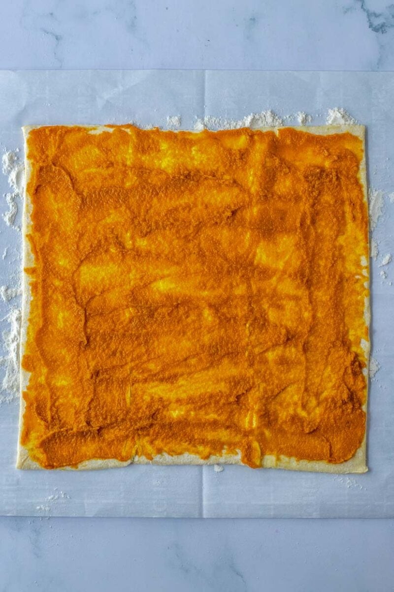 Puff pastry spread with pumpkin filling.