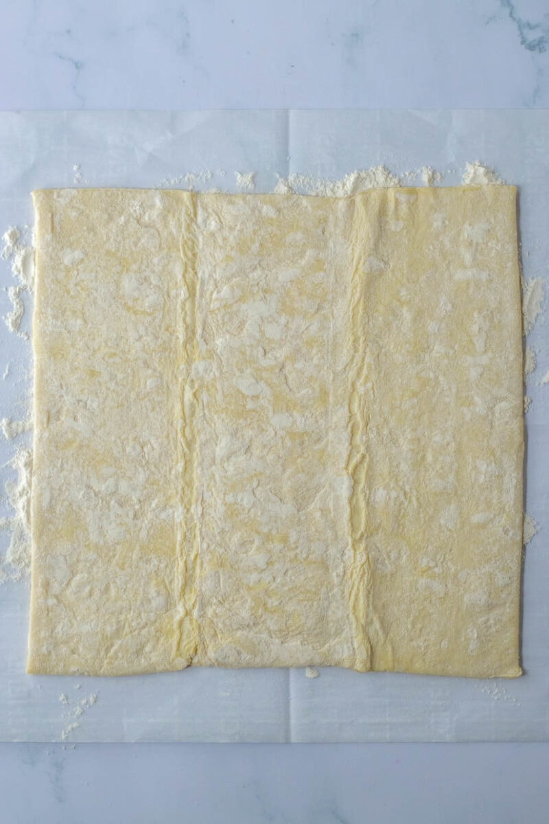 Unrolled sheet of puff pastry.