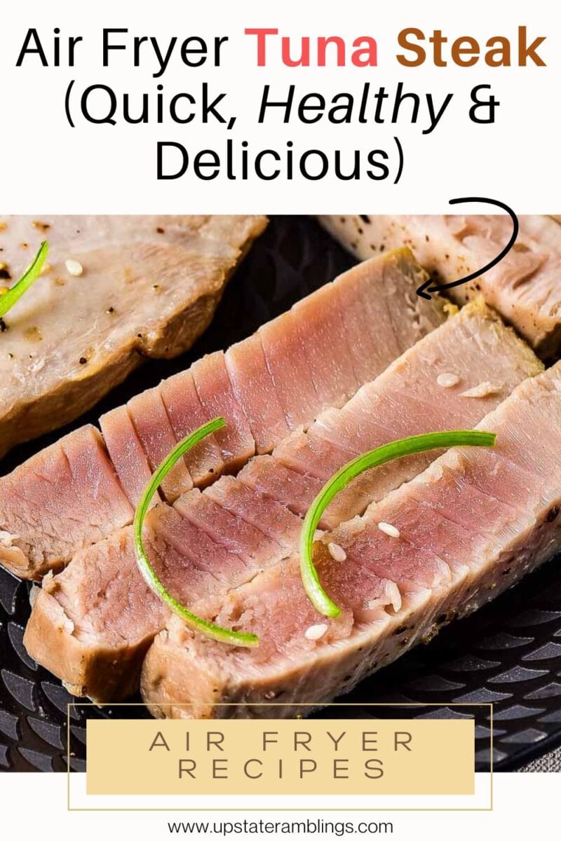 Close-up of sliced seared air fryer tuna steak topped with green garnish and sesame seeds, accompanied by text promoting this quick, healthy, and delicious recipe.