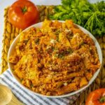 Bowl of slow cooker baked ziti.