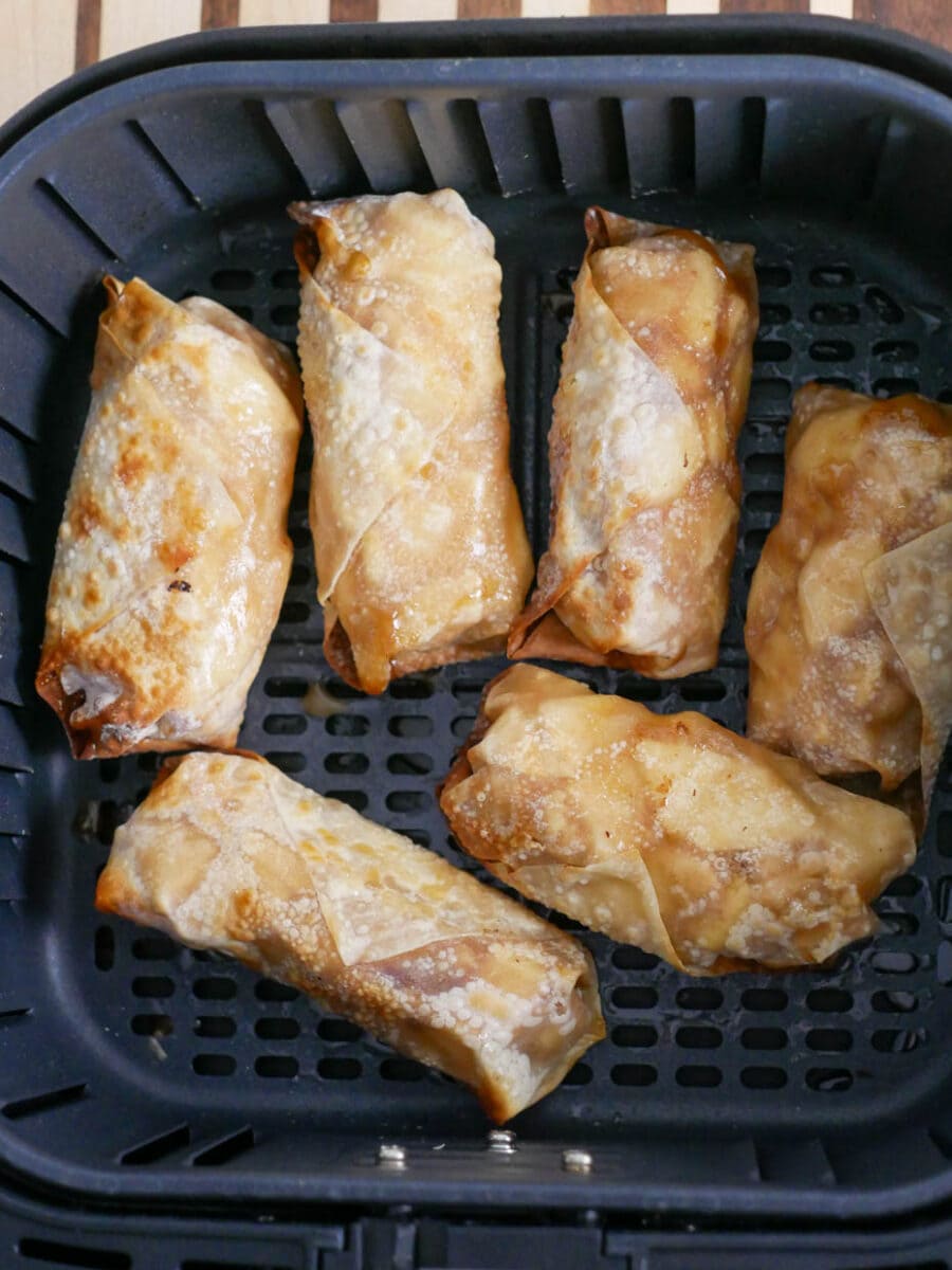 Apple pie egg rolls after air frying.