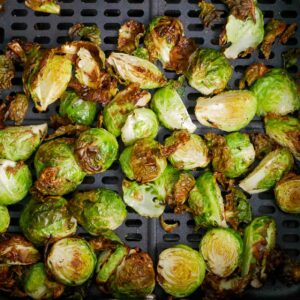 Roasted brussels sprouts on a baking sheet.