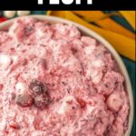 Cranberry fluff in a bowl on a table.