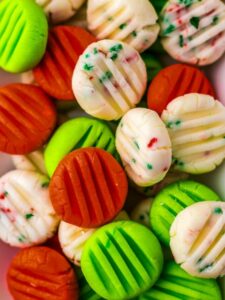 A pile of green, red, and white candy canes.