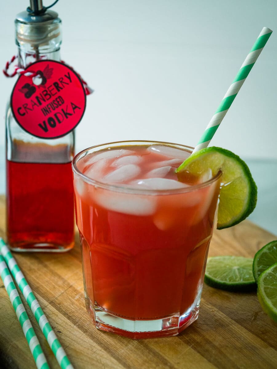 St valentine's day cocktail with limes and straws.