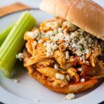 Buffalo chicken sandwich with blue cheese and celery.