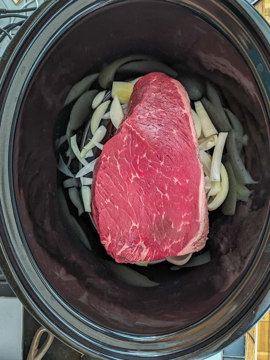 ingredients of Slow Cooker French Dip in a crock pot
