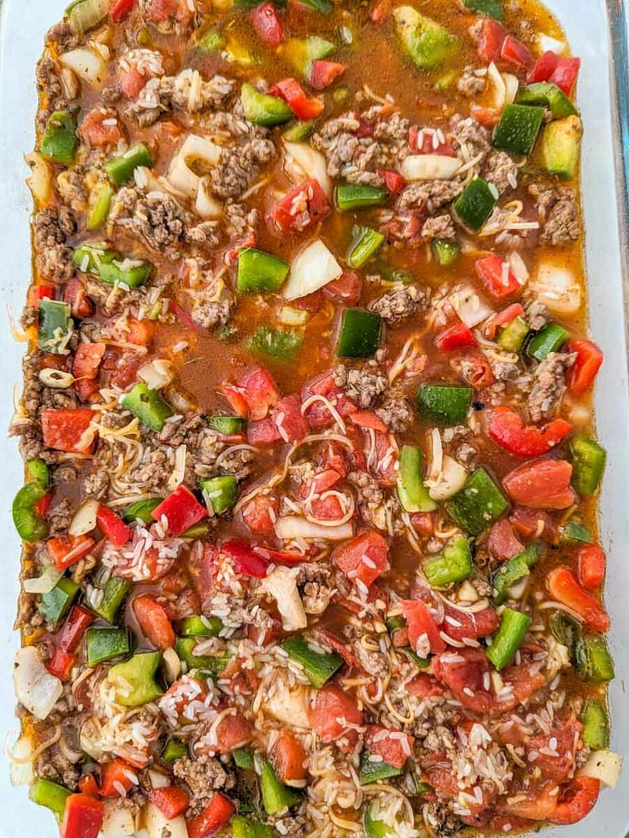 A casserole dish filled with meat and vegetables.