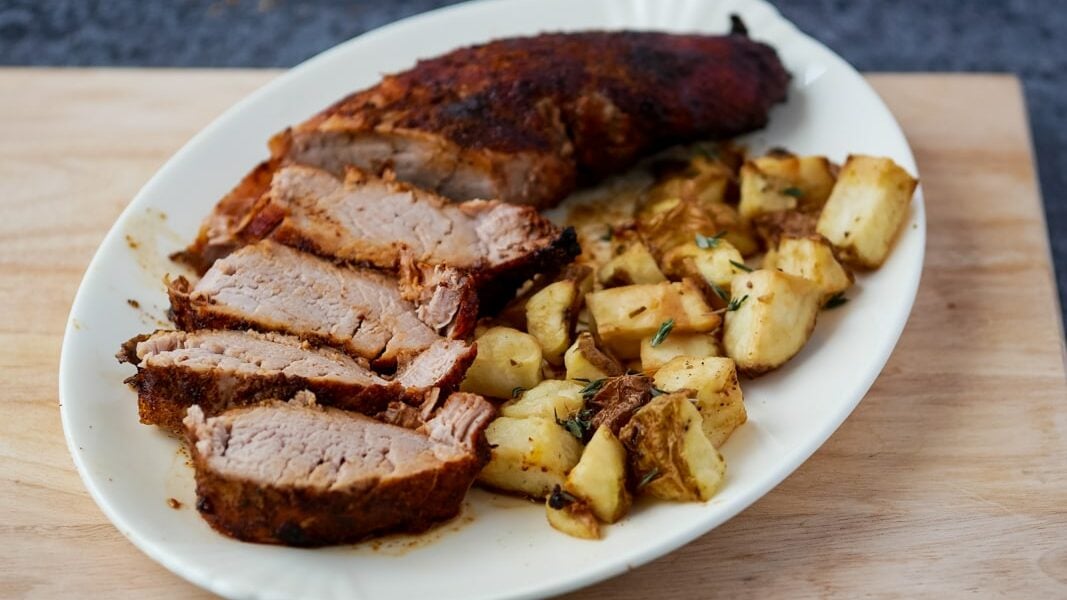 Pork tenderloin ready for eating after cooking in the air fryer.