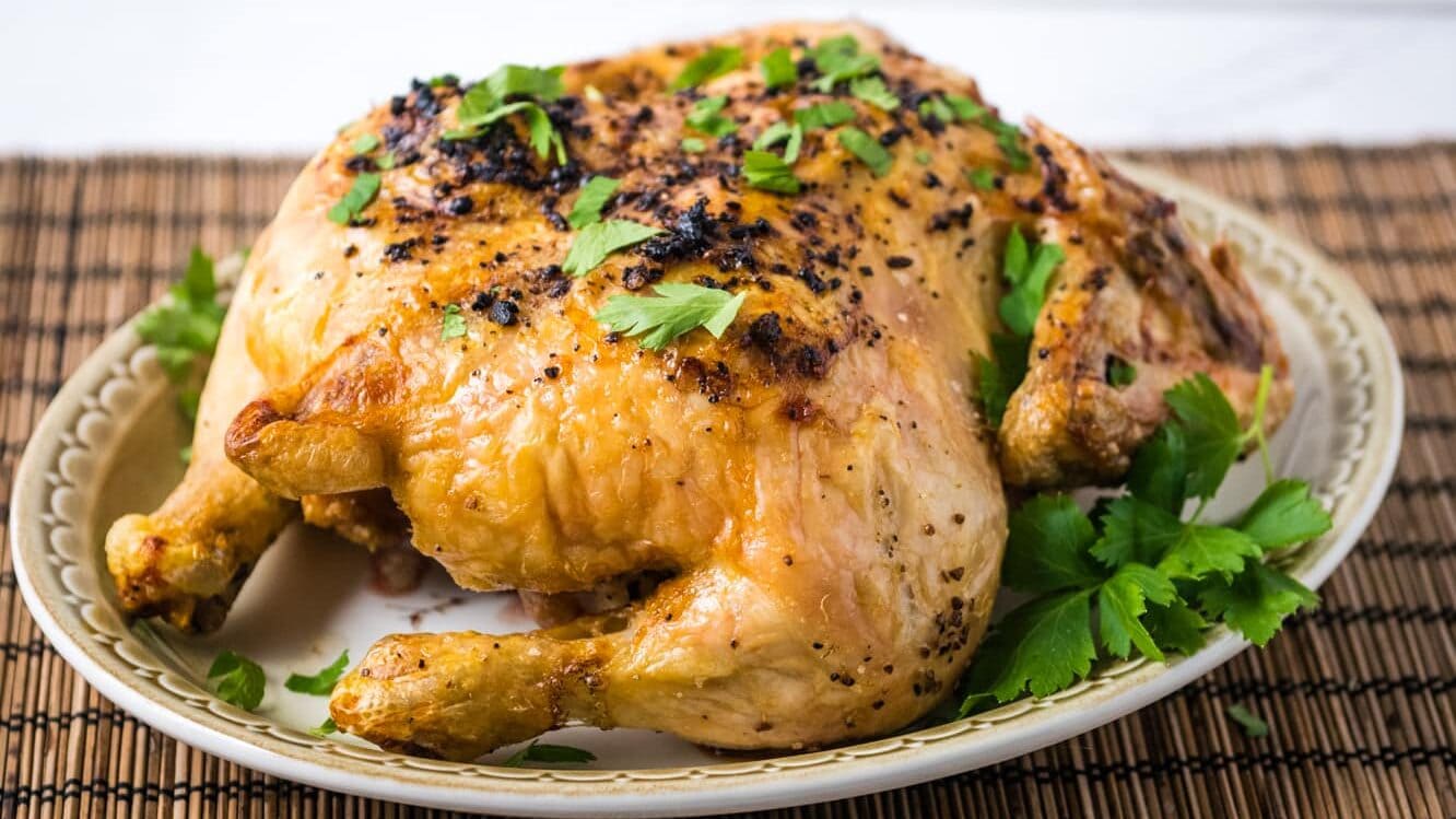 air fryer whole chicken on a plate