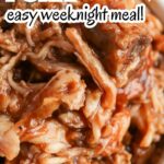 Close-up of a serving of bbq cola pulled pork, with a text overlay suggesting it as an easy weeknight meal.