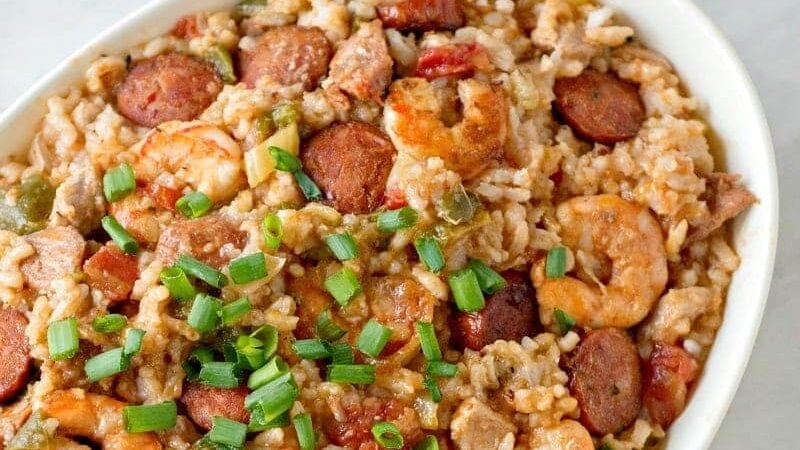 Top view of Instant Pot jambalaya in a white bowl with shrimp and sausage.