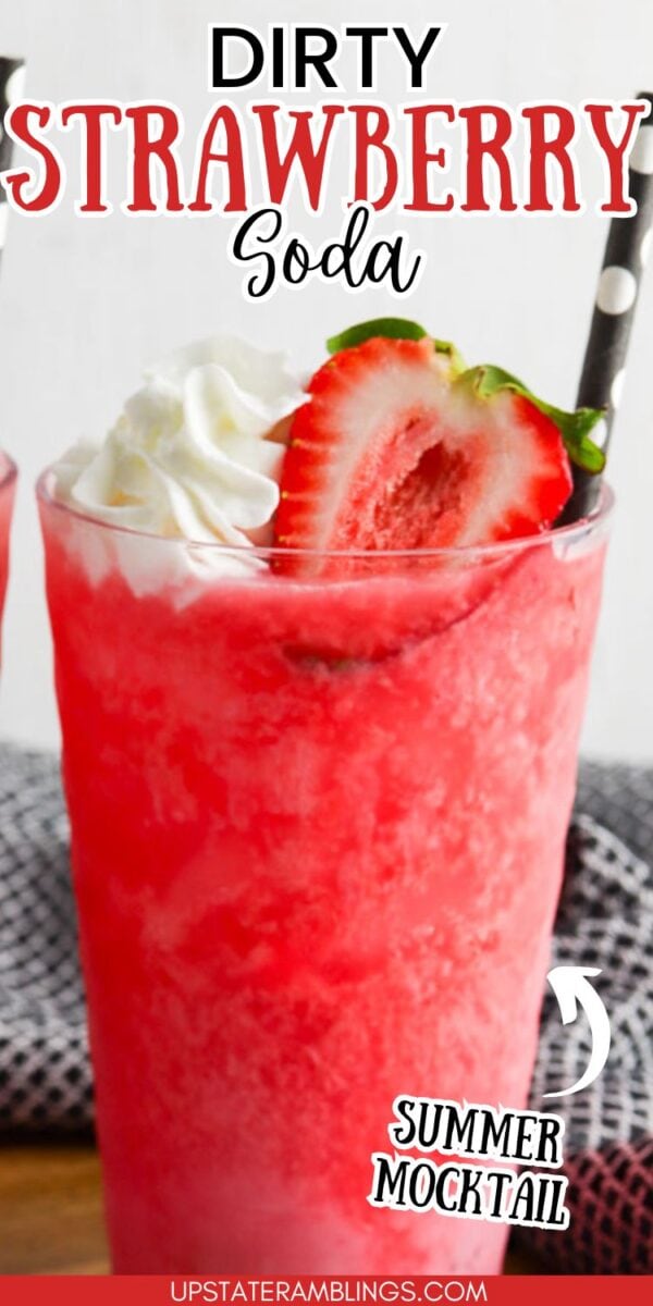 A glass of pink dirty strawberry soda topped with whipped cream, a fresh strawberry slice, and a black straw with white polka dots. Text on image reads "Dirty Strawberry Soda, Summer Mocktail.