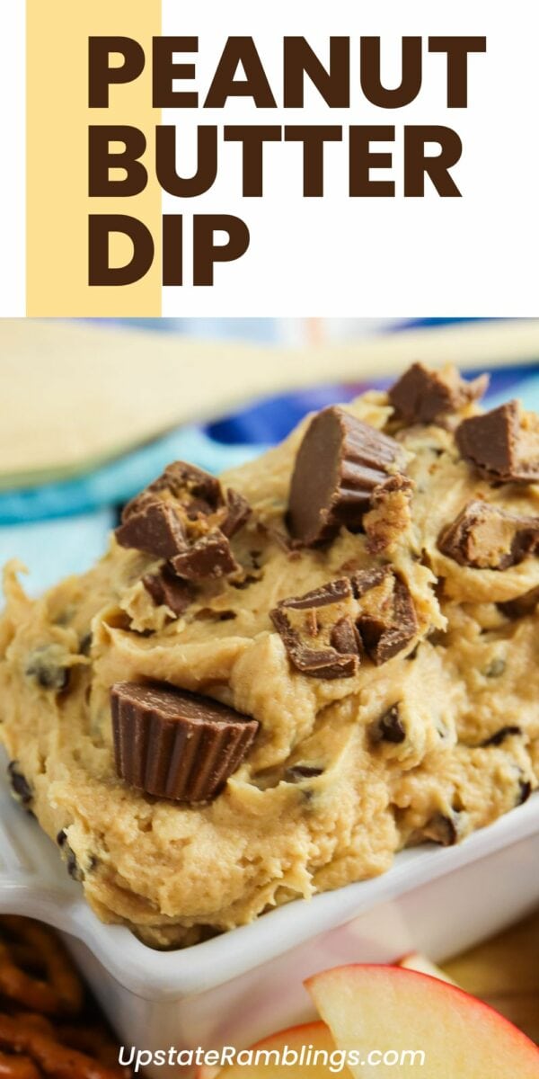 A close-up of a peanut butter dip topped with chopped peanut butter cups, served in a white dish. The text at the top reads "Peanut Butter Dip" while the bottom text reads "Upstateramblings.com".