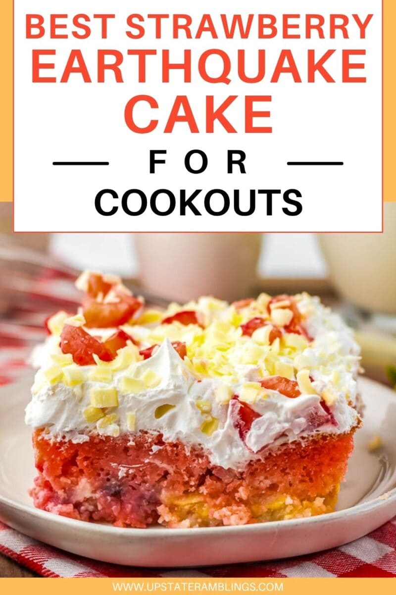 A slice of strawberry earthquake cake topped with whipped cream, fresh strawberries, and white chocolate shavings on a plate—perfect for your next cookout.
