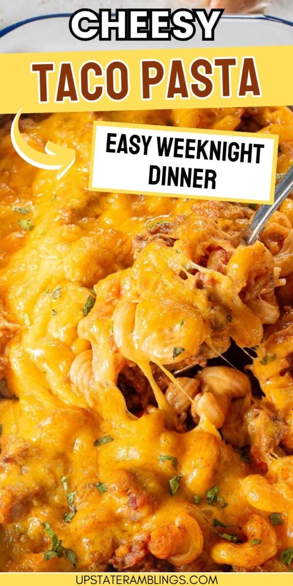 A serving of cheesy taco pasta casserole is scooped from a baking dish, topped with melted cheddar cheese, with text overlay reading "Cheesy Taco Pasta, Easy Weeknight Dinner.