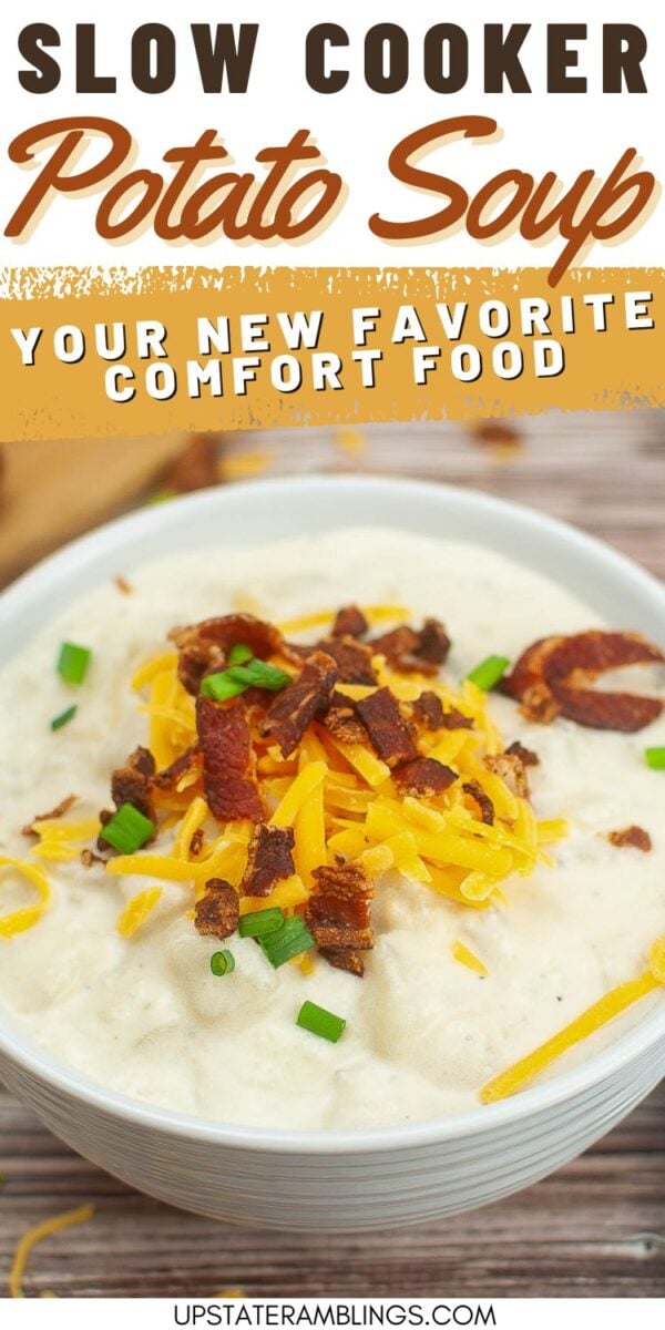 A bowl of potato soup topped with shredded cheese, crispy bacon bits, and chopped green onions. The text reads, "Slow Cooker Potato Soup - Your New Favorite Comfort Food.
