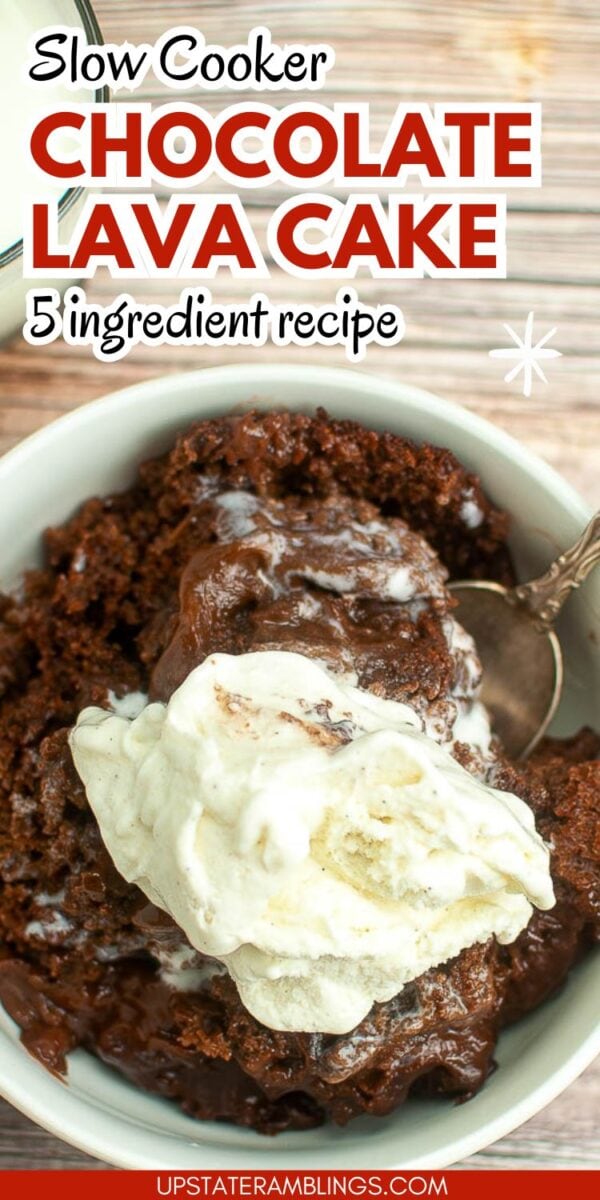 A bowl of slow cooker chocolate lava cake topped with a scoop of vanilla ice cream, a spoon beside it. Text overlay highlights an easy 5-ingredient slow cooker chocolate lava cake recipe.