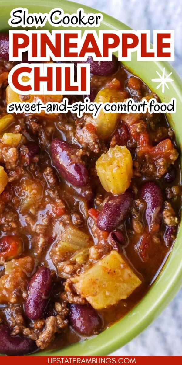 A bowl of pineapple chili with ground meat, kidney beans, tomatoes, and pineapple chunks, described as slow cooker sweet-and-spicy comfort food.