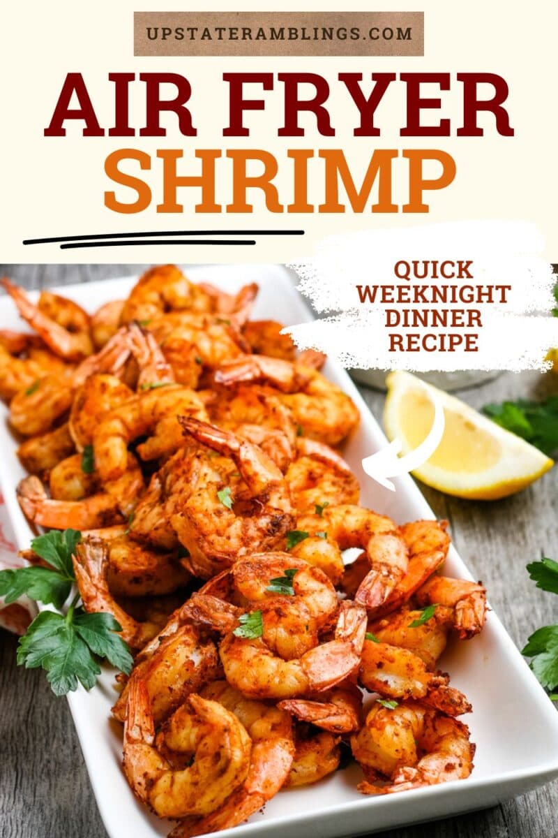 Rectangular white plate filled with cooked, seasoned shrimp garnished with parsley, with lemon wedges on the side; text reads "Air Fryer Shrimp" and "Quick Weeknight Dinner Recipe.