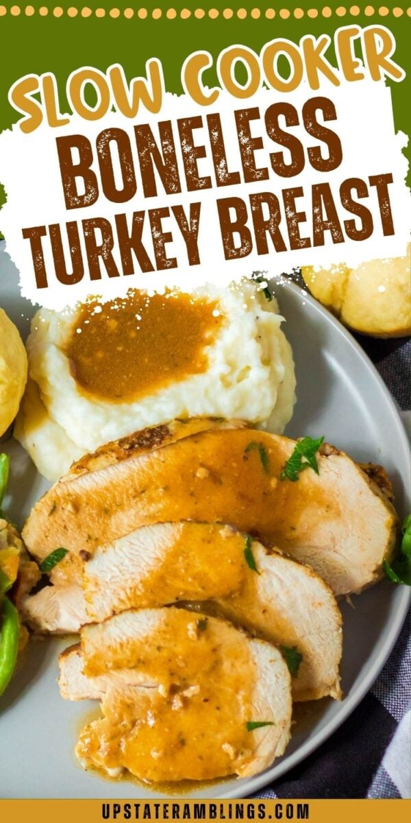 Plate with sliced boneless turkey breast topped with gravy, mashed potatoes with gravy, a biscuit, and green beans. Text above reads "Slow Cooker Boneless Turkey Breast.